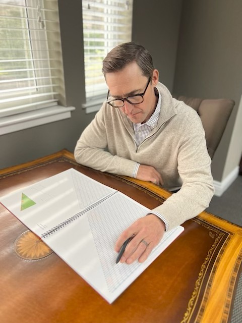 Scott Lucia working with clients